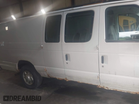 2011 Ford Econoline Cargo Commercial with VIN 1FTSS3ELXBDA58054, listed as a IAAI auction lot 42641162 with 103,413 mi miles and . Bid and sale history available at DreamBid. Image 13.