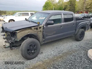 2015 Toyota Tacoma PreRunner with VIN 5TFJU4GN3FX074076, listed as a Copart auction lot 52088495 with 122,527 mi miles and Salvage title. Bid and sale history available at DreamBid. Image 1.