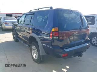 2002 Mitsubishi Montero Sport ES with VIN JA4LS21H02J040318, listed as a IAAI auction lot 41272566 with 278,339 mi miles. Bid and sale history available at carsss.com. Image 3.