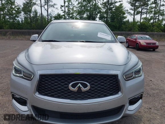 2020 Infiniti QX60 Luxe z VIN 5N1DL0MN9LC528083, wystawiony jako IAAI lot #42414461 z przebiegiem 87 812 mil mil oraz . Historia ofert i sprzedaży dostępna na DreamBid. Obrazek 6.