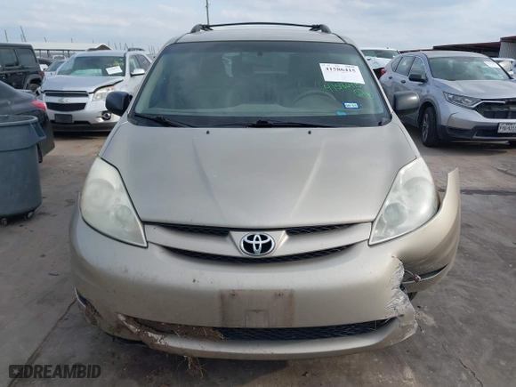 2010 Toyota Sienna CE with VIN 5TDKK4CC9AS311702, listed as a IAAI auction lot 41586415 with 206,453 mi miles. Bid and sale history available at carsss.com. Image 12.