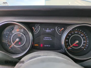2023 Jeep Wrangler Sport S with VIN 1C4HJXDN5PW678653, listed as a Copart auction lot 57464705 with 22,154 mi miles and Salvage title. Bid and sale history available at DreamBid. Image 9.
