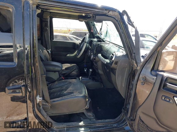 2016 Jeep Wrangler Unlimited 75th Anniversary with VIN 1C4BJWEGXGL270750, listed as a IAAI auction lot 42098170 with 87,316 mi miles and . Bid and sale history available at DreamBid. Image 5.
