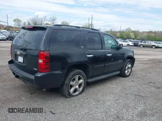 2008 Chevrolet Tahoe LTZ with VIN 1GNFK13088J203852, listed as a IAAI auction lot 41912285 with 205,290 mi miles and . Bid and sale history available at DreamBid. Image 4.