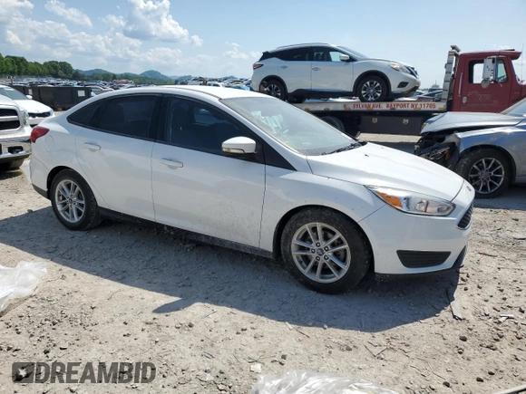 2017 Ford Focus SE with VIN 1FADP3F21HL255540, listed as a Copart auction lot 55151245 with 112,161 mi miles and Salvage Title. Bid and sale history available at DreamBid. Image 4.