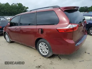 2015 Toyota Sienna XLE with VIN 5TDYK3DC4FS643881, listed as a Copart auction lot 56684635 with 137,781 mi miles and Salvage Title. Bid and sale history available at DreamBid. Image 2.