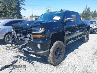 2018 Chevrolet Silverado 1500 LT with VIN 3GCUKREC7JG544365, listed as a IAAI auction lot 42055441 with 57,832 mi miles. Bid and sale history available at carsss.com. Image 2.