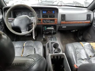 1997 Jeep Grand Cherokee Limited with VIN 1J4GZ78Y0VC599554, listed as a Copart auction lot 72006854 with 321,283 mi miles and Salvage Title. Bid and sale history available at carsss.com. Image 8.