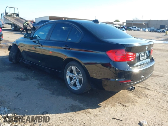 2014 BMW 3 Series 328i with VIN WBA3C1C55EK117180, listed as a IAAI auction lot 41389969 with 163,760 mi miles. Bid and sale history available at carsss.com. Image 3.