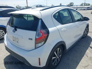 2018 Toyota Prius One with VIN JTDKDTB33J1613019, listed as a IAAI auction lot 42063768 with 59,143 mi miles and . Bid and sale history available at DreamBid. Image 4.