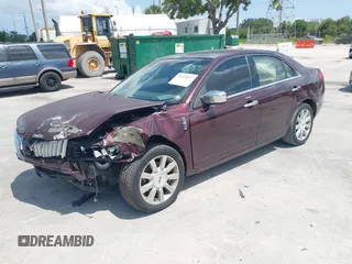 2011 Lincoln MKZ with VIN 3LNHL2GC1BR764783, listed as a IAAI auction lot 39223837 with 118,210 mi miles and . Bid and sale history available at DreamBid. Image 2.