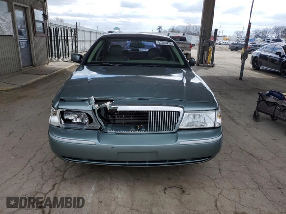 2005 Mercury Grand Marquis LS Premium with VIN 2MEFM75W05X615367, listed as a Copart auction lot 52590275 with 203,052 mi miles and Salvage Title. Bid and sale history available at carsss.com. Image 5.