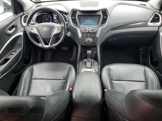 2015 Hyundai Santa Fe z VIN 5XYZWDLA9FG249515, wystawiony jako Copart lot #62689995 z przebiegiem 149 181 mil mil oraz Szkoda całkowita • Salvage title. Historia ofert i sprzedaży dostępna na DreamBid. Obrazek 8.