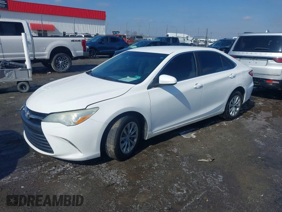 2016 Toyota Camry XLE with VIN 4T1BF1FK1GU155709, listed as a IAAI auction lot 41556465 with 159,923 mi miles and . Bid and sale history available at DreamBid. Image 19.