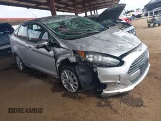 2014 Ford Fiesta SE with VIN 3FADP4BJ9EM196038, listed as a IAAI auction lot 41916159 with 85,582 mi miles. Bid and sale history available at carsss.com. Image 1.