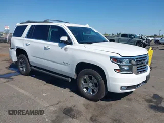 2017 Chevrolet Tahoe LT with VIN 1GNSKBKC4HR356570, listed as a IAAI auction lot 42762093 with 146,679 mi miles and . Bid and sale history available at DreamBid. Image 1.