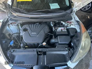 2012 Hyundai Veloster w/Red Int with VIN KMHTC6AD6CU036826, listed as a Copart auction lot 82190224 with 169,497 mi miles and Clean title. Bid and sale history available at DreamBid. Image 7.