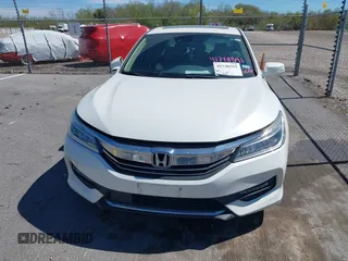2016 Honda Accord Touring with VIN 1HGCR3F93GA024342, listed as a IAAI auction lot 41748591 with 95,253 mi miles and . Bid and sale history available at DreamBid. Image 13.