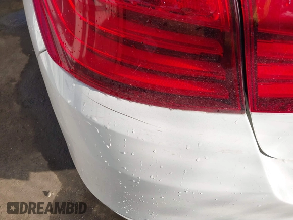 2015 BMW 5 Series 528i with VIN WBA5A5C5XFD520132, listed as a IAAI auction lot 41433751 with 76,576 mi miles and . Bid and sale history available at DreamBid. Image 6.