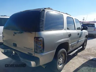 2001 Chevrolet Tahoe LS z VIN 1GNEC13T61R208266, wystawiony jako IAAI lot #41370967 z przebiegiem 378 105 mil mil oraz . Historia ofert i sprzedaży dostępna na DreamBid. Obrazek 4.