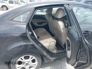 2014 Ford Fiesta SE z VIN 3FADP4BJXEM232657, wystawiony jako IAAI lot #42132147 z przebiegiem 290 396 mil mil oraz . Historia ofert i sprzedaży dostępna na DreamBid. Obrazek 8.