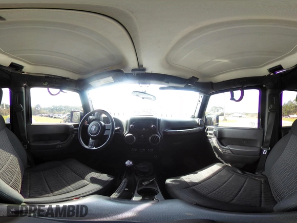 2012 Jeep Wrangler Unlimited Sport with VIN 1C4BJWDG2CL258264, listed as a IAAI auction lot 41880235 with 173,661 mi miles. Bid and sale history available at carsss.com. Image 19.