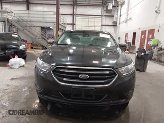 2014 Ford Taurus Limited z VIN 1FAHP2J8XEG112565, wystawiony jako IAAI lot #41554413 z przebiegiem 180 870 mil mil oraz . Historia ofert i sprzedaży dostępna na DreamBid. Obrazek 12.