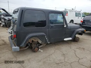2002 Jeep Wrangler Sport z VIN 1J4FA49S22P763189, wystawiony jako Copart lot #57650295 z przebiegiem 197 383 mil mil oraz Czysty tytuł • Clean title. Historia ofert i sprzedaży dostępna na DreamBid. Obrazek 3.
