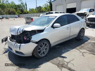 2010 Kia Forte EX z VIN KNAFU4A29A5053433, wystawiony jako Copart lot #52855105 z przebiegiem Nie podano mil oraz Szkoda całkowita • Salvage title. Historia ofert i sprzedaży dostępna na DreamBid. Obrazek 1.