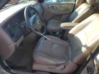 2002 Mazda Tribute LX with VIN 4F2YU09182KM36685, listed as a Copart auction lot 79732664 with 204,262 mi miles and Salvage Title. Bid and sale history available at carsss.com. Image 7.