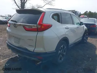 2018 Honda CR-V Touring with VIN 2HKRW2H96JH690197, listed as a IAAI auction lot 41902741 with 34,637 mi miles. Bid and sale history available at carsss.com. Image 4.