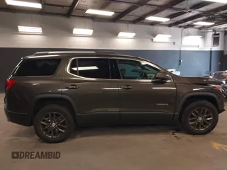 2019 GMC Acadia SLT with VIN 1GKKNMLS1KZ289312, listed as a IAAI auction lot 42123763 with 76,352 mi miles and . Bid and sale history available at DreamBid. Image 13.