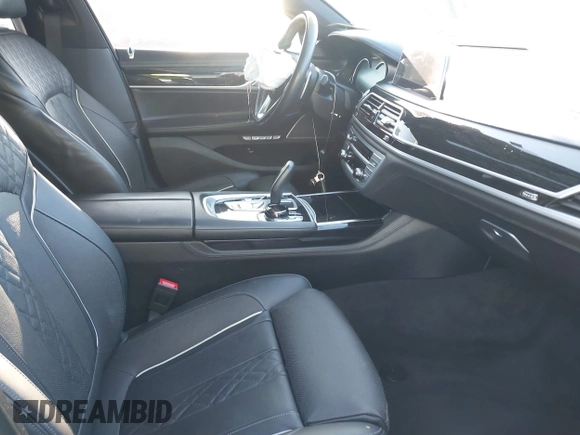 2018 BMW 7 Series 750i with VIN WBA7F0C50JGM24160, listed as a IAAI auction lot 41448519 with 138,742 mi miles. Bid and sale history available at carsss.com. Image 5.