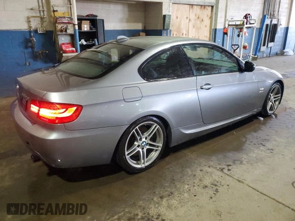 2011 BMW 3 Series 335is with VIN WBAKG1C56BE599457, listed as a Copart auction lot 52412655 with 134,497 mi miles and Clean title. Bid and sale history available at DreamBid. Image 3.