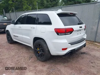 2021 Jeep Grand Cherokee Trackhawk with VIN 1C4RJFN95MC843131, listed as a IAAI auction lot 42688185 with 16,391 mi miles and . Bid and sale history available at DreamBid. Image 3.