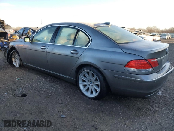 2006 BMW 7 Series 750i with VIN WBAHL83596DT03728, listed as a Copart auction lot 87855795 with 127,513 mi miles and Salvage title. Bid and sale history available at DreamBid. Image 2.