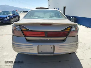 2003 Pontiac Bonneville SE z VIN 1G2HX52KX34177635, wystawiony jako Copart lot #60222734 z przebiegiem 303 653 mil mil oraz Szkoda całkowita • Salvage title. Historia ofert i sprzedaży dostępna na DreamBid. Obrazek 6.
