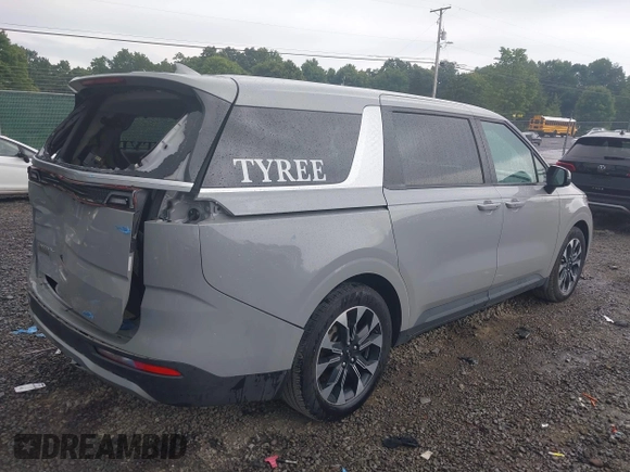 2024 Kia Carnival EX with VIN KNDNC5H31R6377648, listed as a IAAI auction lot 40124659 with 14,386 mi miles and . Bid and sale history available at DreamBid. Image 4.