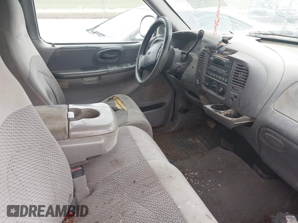 1999 Ford F-150 XL with VIN 1FTRX18L5XNA88483, listed as a IAAI auction lot 42717246 with 251,723 mi miles and . Bid and sale history available at DreamBid. Image 5.