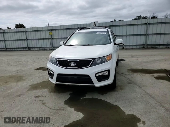 2012 Kia Sorento SX z VIN 5XYKWDA25CG280219, wystawiony jako Copart lot #54397025 z przebiegiem 197 685 mil mil oraz Szkoda całkowita • Salvage title. Historia ofert i sprzedaży dostępna na DreamBid. Obrazek 13.