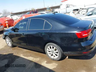 2015 Volkswagen Jetta SE z VIN 3VWD17AJ2FM318882, wystawiony jako IAAI lot #42041914 z przebiegiem 97 623 mil mil oraz . Historia ofert i sprzedaży dostępna na DreamBid. Obrazek 14.