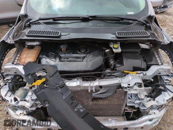 2016 Ford Escape SE z VIN 1FMCU0G91GUC59990, wystawiony jako Copart lot #56956395 z przebiegiem 112 706 mil mil oraz Szkoda całkowita • Salvage title. Historia ofert i sprzedaży dostępna na DreamBid. Obrazek 12.