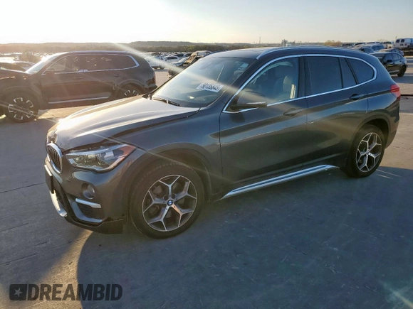 2019 BMW X1 xDrive28i with VIN WBXHT3C51K3H34687, listed as a Copart auction lot 50135845 with 59,549 mi miles and Salvage Title. Bid and sale history available at carsss.com. Image 1.