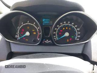2019 Ford Fiesta SE z VIN 3FADP4BJ0KM133096, wystawiony jako IAAI lot #42204601 z przebiegiem 108 904 mil mil oraz . Historia ofert i sprzedaży dostępna na DreamBid. Obrazek 7.