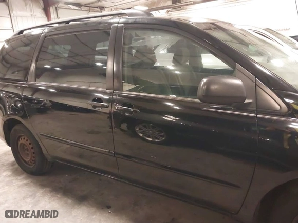 2008 Toyota Sienna CE with VIN 5TDZK23C28S214239, listed as a IAAI auction lot 41592957 with 214,229 mi miles. Bid and sale history available at carsss.com. Image 14.