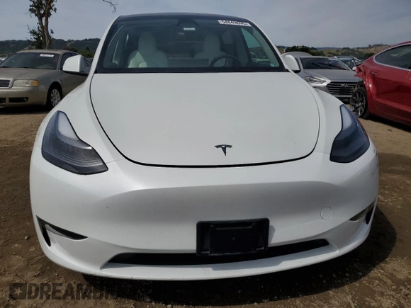 2023 Tesla Model Y Long Range z VIN 7SAYGDEE3PF815088, wystawiony jako Copart lot #54849895 z przebiegiem 19 637 mil mil oraz Szkoda całkowita • Salvage title. Historia ofert i sprzedaży dostępna na DreamBid. Obrazek 5.