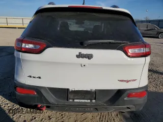 2016 Jeep Cherokee Trailhawk z VIN 1C4PJMBS2GW334801, wystawiony jako Copart lot #87434324 z przebiegiem 92 887 mil mil oraz Szkoda całkowita • Salvage title. Historia ofert i sprzedaży dostępna na DreamBid. Obrazek 6.