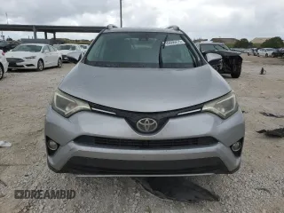 2018 Toyota RAV4 XLE with VIN 2T3WFREV4JW444884, listed as a Copart auction lot 55666275 with 174,275 mi miles and Salvage Title. Bid and sale history available at DreamBid. Image 5.
