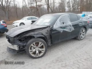 2013 Infiniti M z VIN JN1BY1AR9DM600490, wystawiony jako IAAI lot #41248655 z przebiegiem 125 167 mil mil oraz . Historia ofert i sprzedaży dostępna na DreamBid. Obrazek 17.