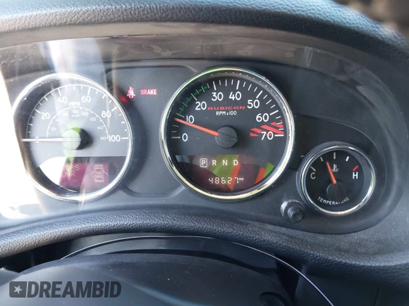 2015 Jeep Wrangler Rubicon Hard Rock with VIN 1C4BJWCG1FL610028, listed as a IAAI auction lot 42318569 with 48,627 mi miles and . Bid and sale history available at DreamBid. Image 7.
